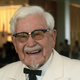 colonel sanders smiling for the camera